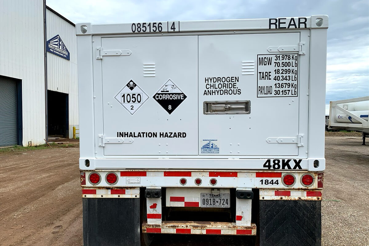 Gas Innovations fuel tanker truck parked at an industrial facility with storage tanks and gas processing equipment.