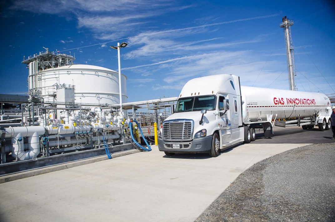 Gas Innovations trust pulling up to a gas filling station